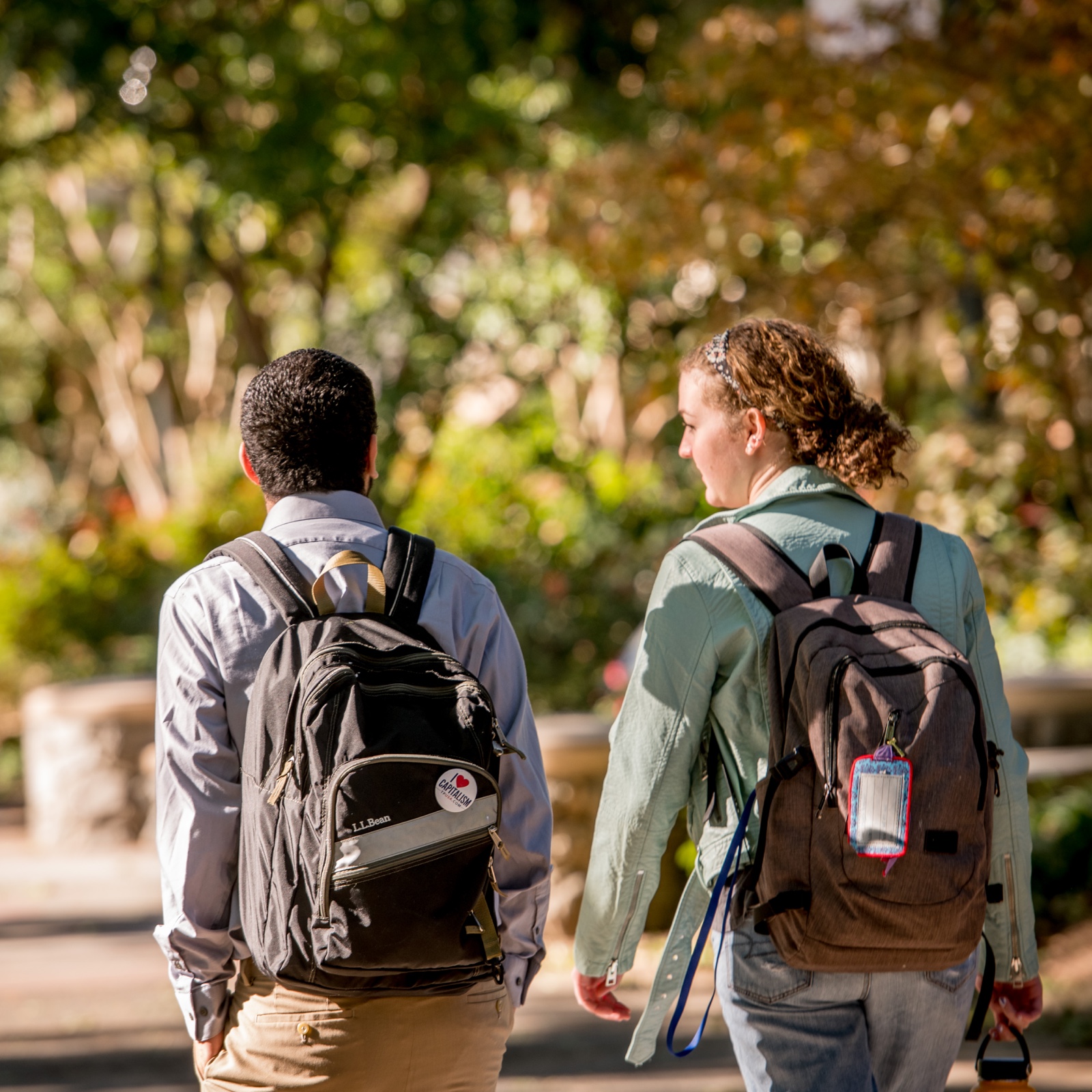 Two students walking together on campus